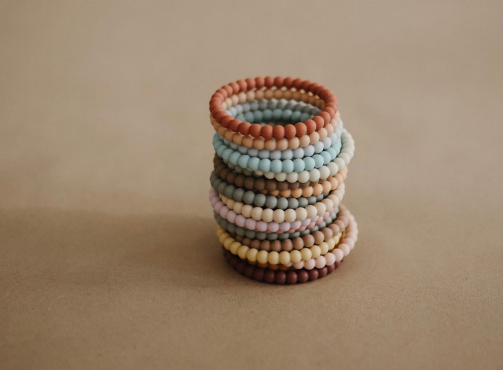 Mushie Silicone Pearl Teether Bracelets | Lilac/Cyan/Soft Peach